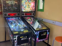 Two pinball machines, Game of Thrones and Ghostbusters, stand side by side. - Photo by DaanNL (25 Jul 2026)